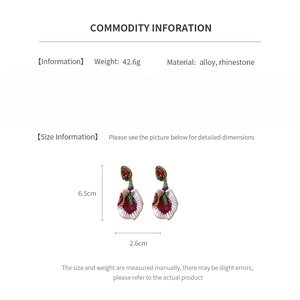 Detailed size and weight chart for vintage drop earrings featuring alloy and rhinestones