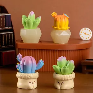 Set of four cute resin cactus succulents with cute faces for desk decoration