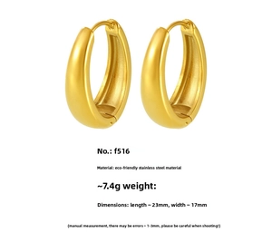 Detailed view of gold hoop earrings with dimensions 23mm x 17mm and weight 7.4g