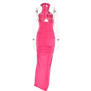 Detail view of pink backless bodycon dress featuring halter neck and gathered ruching fabric