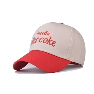 Two-tone baseball cap in off-white and red featuring embroidered diet coke text