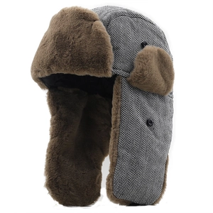 Winter herringbone trapper hat with warm faux fur lining and ear flaps for men