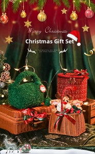 Close-up of Christmas rattan gift box set with plush bags and reindeer basket decor