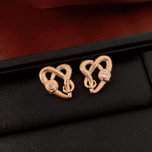 Gold-plated heart-shaped stud earrings with woven texture and central zircon stones