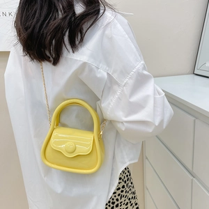 Mini macaron yellow jelly handbag with gold chain strap for shoulder or crossbody use