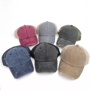 Set of six washed cotton ponytail baseball caps with distressed holes and mesh design