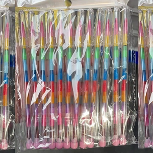 Detail view of colorful stackable block crayons with multi-color segments in clear packaging
