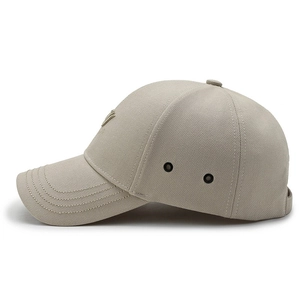 Classic beige hard-top baseball cap with reinforced brim and black metal eyelets