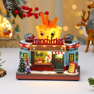 Detailed Christmas French Fries shop music box with internal LED lights and festive decor