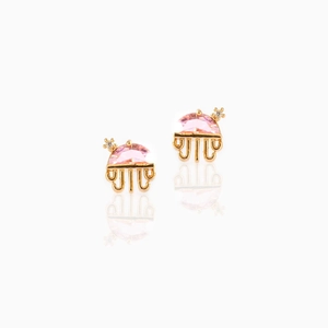 Close-up of golden jellyfish stud earrings with pink stones and clear crystal accents