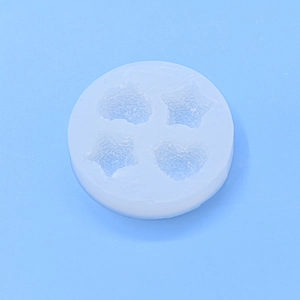 Mini round silicone mold featuring heart and star shapes for DIY baking and desserts