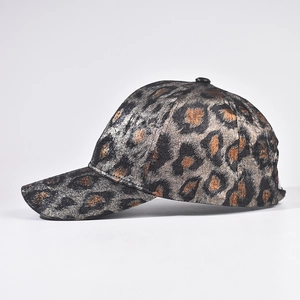 Metallic leopard print baseball cap with gold foil texture and structured hard top design