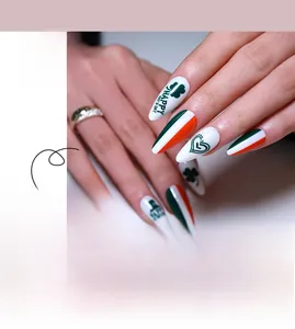 Macro detail of St. Patrick’s Day press-on nails with shamrock and heart art patterns