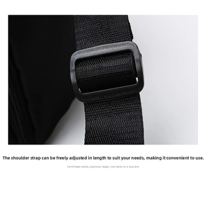 Close-up of adjustable high-density nylon shoulder strap with plastic buckle on travel bag