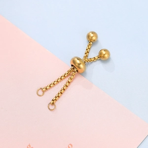 Macro shot of gold-plated sliding adjuster chain for adjustable bracelet and necklace DIY