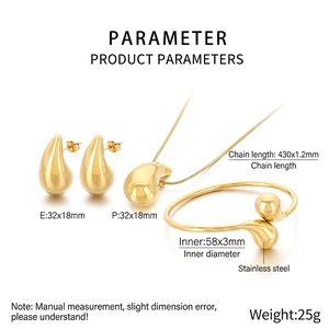 Detailed view of golden teardrop earring necklace and bracelet set with dimensions