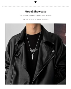 Silver titanium steel cross necklace worn with leather jacket for a punk hip-hop look