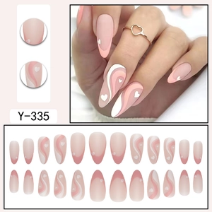 Pink almond fake nails set with heart patterns and French wavy lines, 24 piece kit