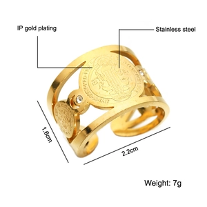 Gold plated stainless steel open ring with religious medallion and crystal detail