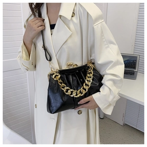 Chic black pleated handbag with chunky gold chain strap and vintage metal clasp closure