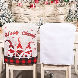 Linen Christmas chair covers with festive gnome prints and Merry Christmas text