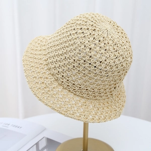 Handcrafted crochet bucket hat for women in beige with breathable hollow weave design