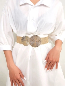 Women stretch woven belt with gold textured double ring buckle on white shirt dress