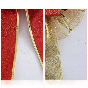 Close-up of glitter ribbon rolls in red and gold colors for Christmas tree decoration