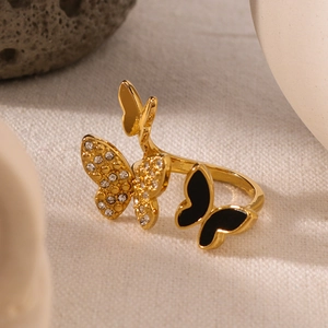 Elegant gold butterfly open ring featuring three butterflies with black enamel and zircons
