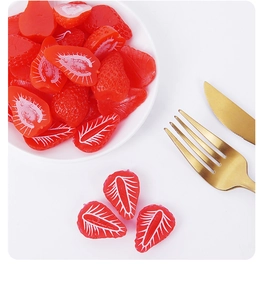 Detailed realistic half strawberry model with white textures on a white ceramic bowl