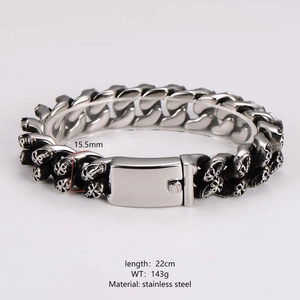 Punk vintage style stainless steel skull bracelet for men in silver and black distressed finish