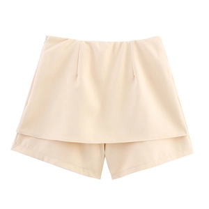 Women's beige skort with asymmetric hem and side zipper for elegant commute style
