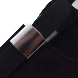Detailed close-up of a silver metal adjustment buckle on black cotton baseball cap strap