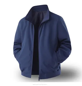 Detail of navy blue stand-up collar jacket showing ribbed cuffs and zipper closure