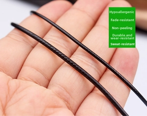 Detail of durable black braided wax cord necklace featuring anti-fading and sweat-proof texture