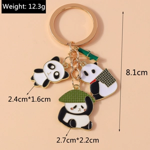 Detail view of cute panda keychain charms showing dimensions and 12.3g weight parameters