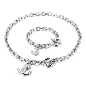 Silver nautical jewelry set featuring anchor pendant necklace and toggle clasp bracelet
