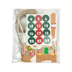 DIY Christmas advent calendar set with gingerbread house candy boxes and numeric stickers