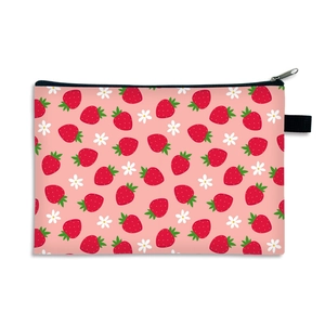 Pink waterproof cosmetic bag with strawberry print and floral patterns for women