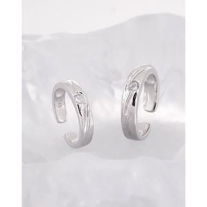Minimalist S925 sterling silver couple rings with matte texture and small diamond accents