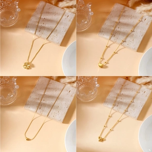 Elegant 18K gold titanium steel necklace set with heart clover and bow pendants