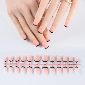 Close-up of matte nude and black French tip false nails with 24-piece full set layout