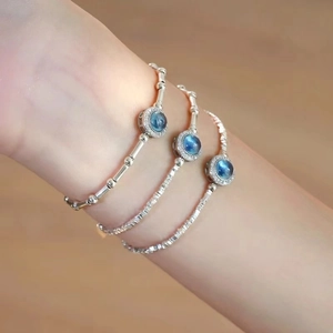 Natural aquamarine silver bracelet set with bamboo beads and elegant blue gemstone charm