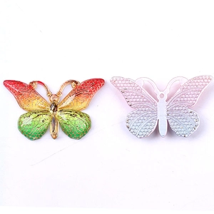 DIY butterfly resin charms in gradient colors and translucent white for jewelry making