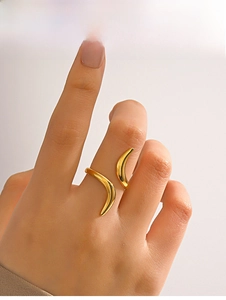 Detail shot of 18K gold plated minimalist open ring with sleek streamlined curves