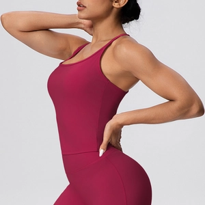 Detail view of burgundy racerback sports bra with elastic fabric and slim fit design