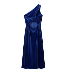 Detail of royal blue velvet one-shoulder dress with elegant back cutout design