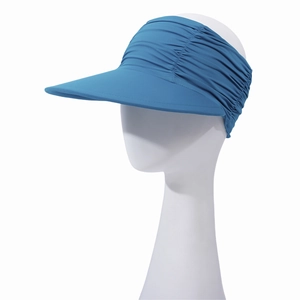 Detail of blue sun visor with pleated cooling fabric on a white model head