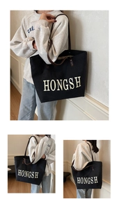 Three-view layout of large black canvas tote bag with white letter print