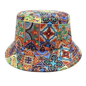 Close-up of Sicilian tile print bucket hat with vibrant sun flower patterns and colors